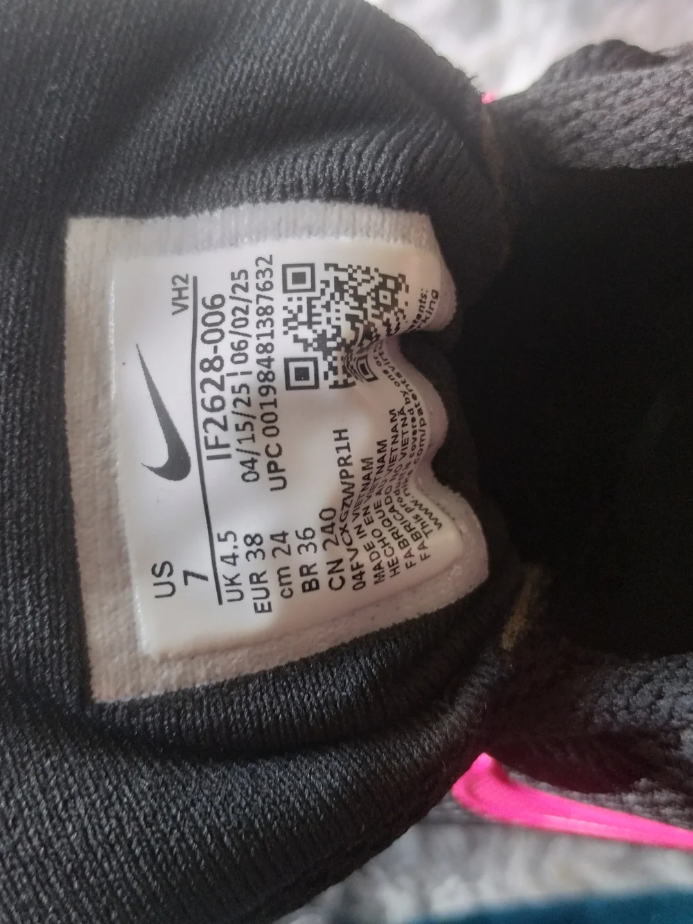 Nike Women's Black Athletic Sneakers with Pink Swoosh